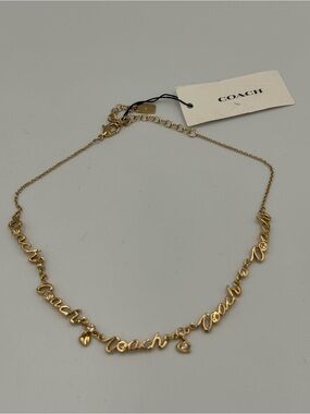 COACH Gold Script Logo Link Necklace with Heart, Sparkles and Signature C Charm
